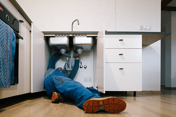 Professional Drain Cleaning technician working in Sidney, IL